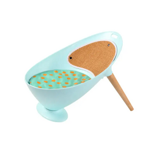 Pet toy with a blue base, brown textured area, and wooden handle on a white background