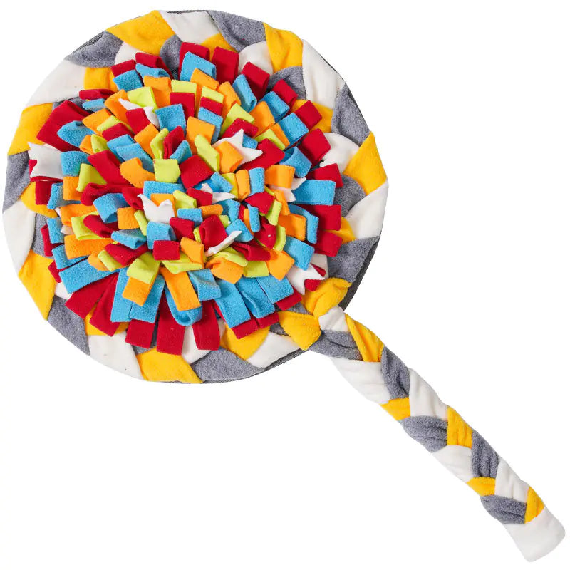 Colorful pet toy shaped like a lollipop with a braided handle on a white background