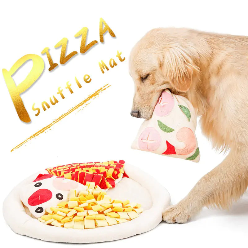 Dog playing with a pizza-shaped toy and mat on a white background