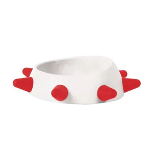White bowl with red heart-shaped accents on a white background